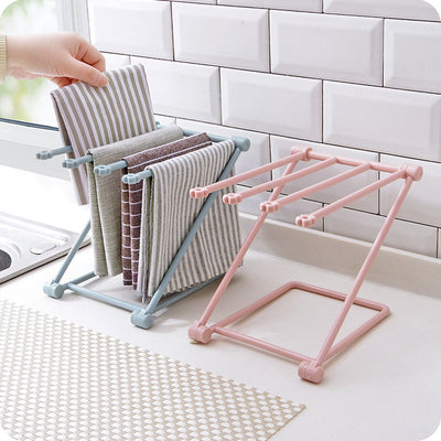 Keep your kitchen neat with this foldable dishcloth shelf. Perfect for drying towels and organizing cleaning tools, it folds away easily when not in use.