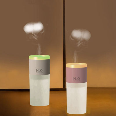 Multi-mode USB aroma diffuser and humidifier creating a relaxing atmosphere in a modern living room